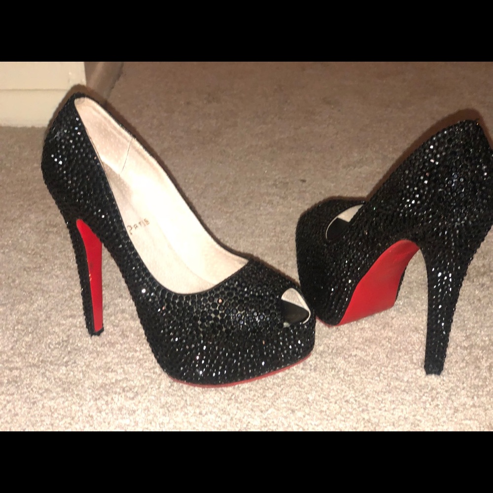 Christian Louboutin black studded heels!